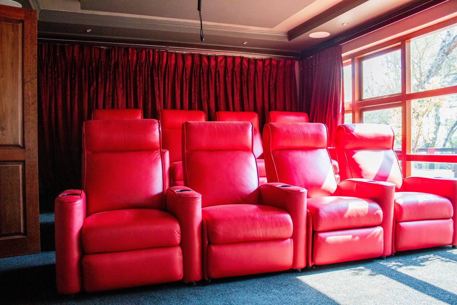 Movie Magic at Home: Stunning Home Cinema Design Ideas 11 home cinema seating and velvet curtains