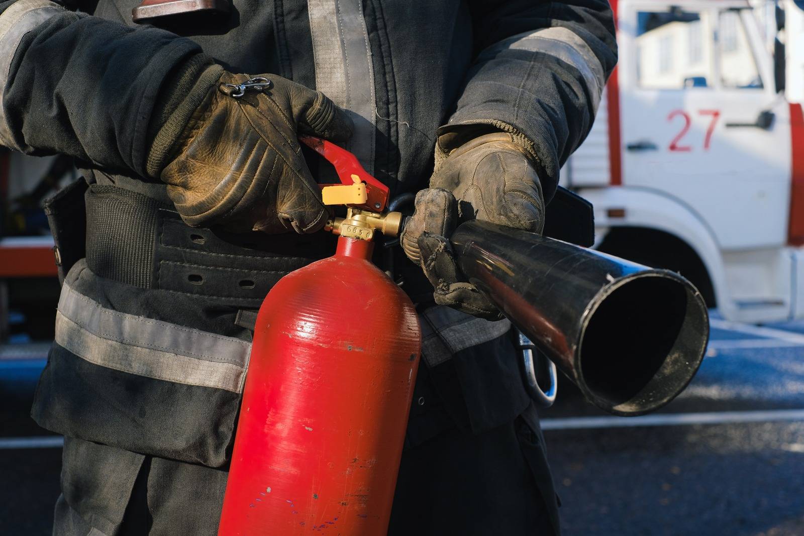 Wired for Urgency: When to Reach Out to an Emergency Electrician 16 fireman with fire extinguisher
